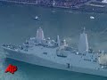 The new Navy assault ship USS New York, built with World Trade Center steel, arrived in its namesake city Monday with a 21-gun salute near the site of the 2001 terrorist attack. (Nov. 2)