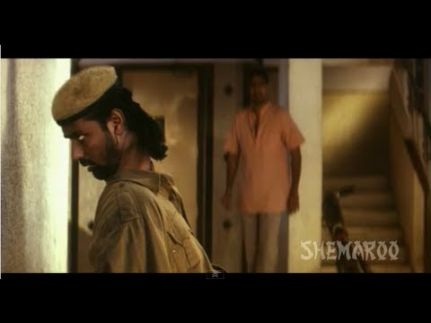 12va - Vishal (Ajay Devgan) and his wife Swati (Urmila Matondkar) get a high rise apartment at a ridiculously low price. Vishal has carefully kept the apartments' s...