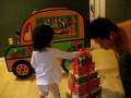 Maiya opening up the gift from GiGiMa and GiGiPa