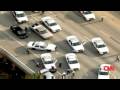 CNN: driver flips over police car
