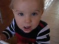 Anton 11 months - Walking with his wagon