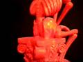 The Thinker skeleton statue -- Fluorescent Pink