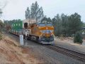 Fall Colors 2009: UP 8414 Leads Stacktrain Westbound at Milepost 210.1