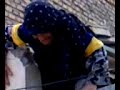 Look at this old lady (over 80) in Iran and how she climbs up the walls toget to her room! It seems to be a routine for her.  I guess nobody will takethe time to fix her door for her, so she has to do this routine whenever shewants to get to her house. And her house looks like 10X10' with no roof!!!