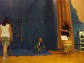 dakota climbs the rock wall