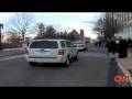 videos de Auto execs arrive at bailout hearing in hybrid cars and ev jeeps