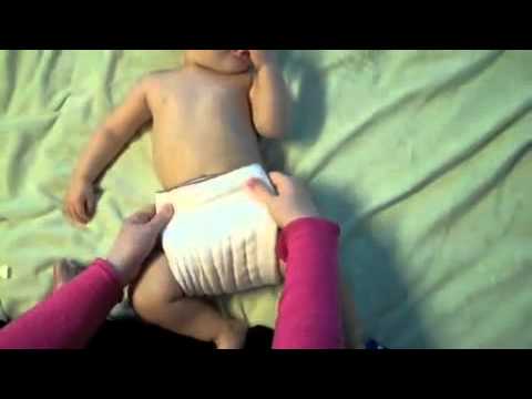 how to fasten a cloth diaper