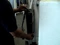 Lifting Up and Pulling Coin Acceptor Away from Mounting