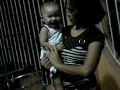 Neya playing with her yaya Laga