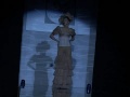 The naked model on a podium The naked model on a podium