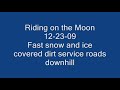 Mountain bike riding in the snow and ice fast downhill roads