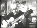 Andres Segovia playing his guitar. Old B/N track.