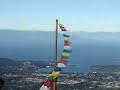 closeup panoramic vid of nanaimo with Tibetain prayer flags closeup panoramic vid of nanaimo with Tibetain prayer flags