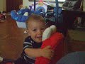 Caden with his Elmo chair