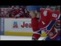 Mike Komisarek Crosschecks Milan Lucic in the Face