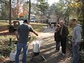 Lowering Turkey into Deep Fryer