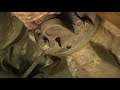 Replacing a Rear Axle U Joint : Removing Retaining Bolts from a Drive Shaft