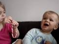 Reese & Alfie Sims sharing a candy cane.... YEAH!!!!!!!!