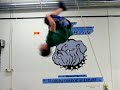 100 back flips, trampoline.  Daniel Day