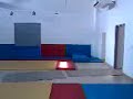 mick harris doing a roley poley in a gym at work, what a cock!
