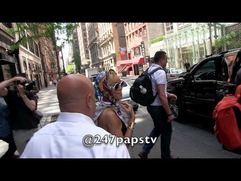 Rihanna rocking a Scarf around her Head while leaving her Hotel in NYC