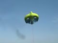 My brother, John, on a Manta Ray kite tube, flying about 30-35 feet, in the air!!!