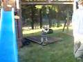 Ethan & Damian going down slide.