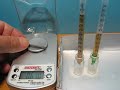 ein draht-st�ck (al) und ein nagelst�ck (fe) werden gewogen. in einem messzylinder aus einer 1-ml insulinspritze misst man das volumen durch wasserdr�ngung.