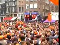 dj sneak spinning records @ a crowded streetparty on queen's day in amsterdam
