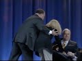 Protester Tries To Cuff Rove