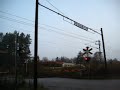 SJ KtK (Kust-till-Kust) train crossing Bomvägen level crossing... SJ KtK (Kust-till-Kust) train crossing Bomvägen level crossing...