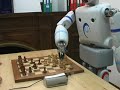 REEM-A, humanoid robot. Playing chess