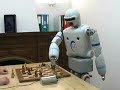 REEM-A, humanoid robot. Playing chess