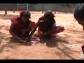 Making kollam powder designs at Udavi