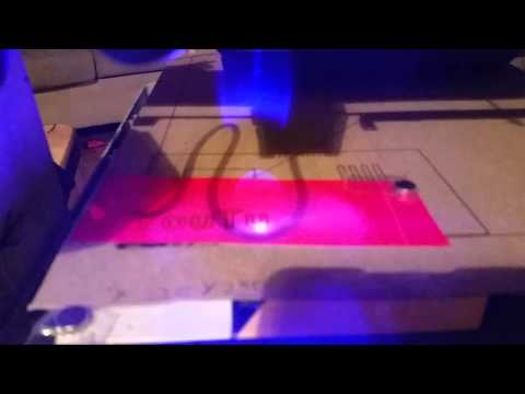 Violet Laser 300mw cutting red paper.