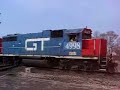 A pair of grand Trunk Western gp38-2's are heading north after waiting for another northbound and 3 csx trains. After this video he will pull clear of the diamond, reverse and switch to another passing track south of the crossing. Enjoy