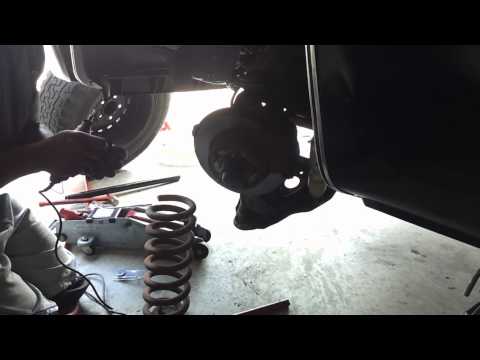 lowering your chevy truck by cutting front coil springs. diy