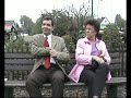 Mr. Bean Double with woman on park bench