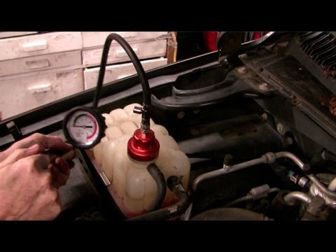 How to replace a water pump, coolant leak in a 2000 Chev GMC Suburban Truck Part I