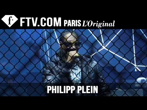 Fashion TV - http://www.FashionTV.com/live MILAN- Watch Philipp Plein's dramatic runway show. Rapper Snoop Dogg opens up the stage of a brooding runway with stomping drummers which make for a dark and...
