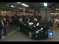 First 2010 chevrolet camaro vin0001 drives off the line - plant footage