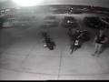 Drunk girl knocks over motorcycle and runs