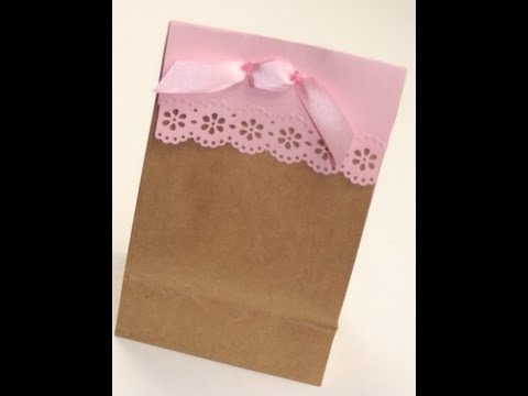 paper bag - Well you know how much I love polka dots and damask, but wow do I love lace as well. In this video I will show you how I used a Martha Stewart paper lace mak...