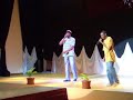 two young artists performing at a fashion show in montserrat
