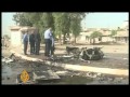 Dozens killed in Iraq blasts