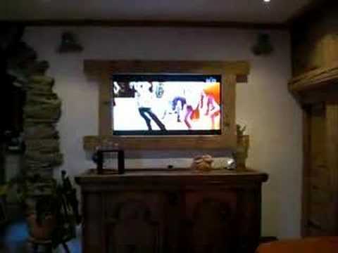 how to hide a tv behind a painting