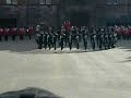 the king's guard of norway performing high precision rifle drill (music provided by the swiss army band. btw they may play well but the marching is quite sloppy and the uniforms are ridiculous: they look like doormen, not like soldiers. additionally, the   drum major's totally incapable in handling his mace.)

(basel tattoo 2008)