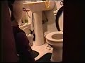 Giant Gay Waluigi in bathroom
