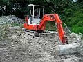 Schaeff HR14 Mini digger tidying up some stone pt2