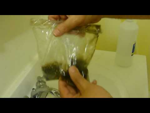 how to unclog ash catcher